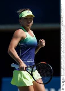 AUG 12, 2015: Simona Halep of Romania celebrates a point against Jelena Jankovic of Serbia during their match on day 3 of the Rogers Cup at the Aviva Centre in Toronto, Ontario, Canada. TENNIS: AUG 12 Rogers Cup - Toronto Icon15081282532 EDITORIAL USE ONLY