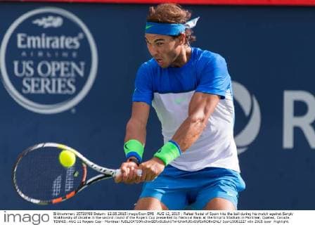 AUG 12, 2015 : Rafael Nadal of Spain hits the ball during his match against Sergiy Stakhovsky of Ukraine in the second round of the Rogers Cup presented by National Bank at the Uniprix Stadium in Montreal, Quebec, Canada. TENNIS: AUG 12 Rogers Cup - Montreal Icon15081227 EDITORIAL USE ONLY
