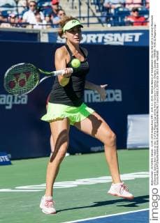 AUG 12, 2015: Belinda Bencic of Switzerland returns the ball to Caroline Wozniacki of Denmark during their match on day 3 of the Rogers Cup at the Aviva Centre in Toronto, Ontario, Canada. TENNIS: AUG 12 Rogers Cup - Toronto Icon150812125733 EDITORIAL USE ONLY