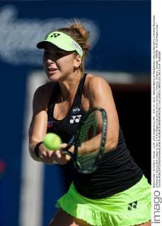 AUG 12, 2015: Belinda Bencic of Switzerland returns the ball to Caroline Wozniacki of Denmark during their match on day 3 of the Rogers Cup at the Aviva Centre in Toronto, Ontario, Canada. TENNIS: AUG 12 Rogers Cup - Toronto Icon150812138833 EDITORIAL USE ONLY
