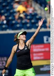 AUG 12, 2015: Belinda Bencic of Switzerland serves the ball to Caroline Wozniacki of Denmark during their match on day 3 of the Rogers Cup at the Aviva Centre in Toronto, Ontario, Canada. TENNIS: AUG 12 Rogers Cup - Toronto Icon150812142933 EDITORIAL USE ONLY