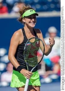 AUG 12, 2015: Belinda Bencic of Switzerland celebrates a point during her match against Caroline Wozniacki of Denmark on day 3 of the Rogers Cup at the Aviva Centre in Toronto, Ontario, Canada. TENNIS: AUG 12 Rogers Cup - Toronto Icon150812146133 EDITORIAL USE ONLY