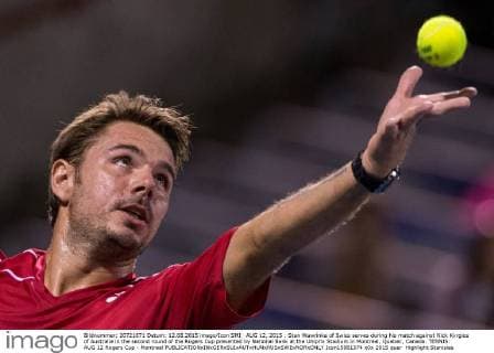 AUG 12, 2015 : Stan Wawrinka of Swiss serves during his match against Nick Kyrgios of Australia in the second round of the Rogers Cup presented by National Bank at the Uniprix Stadium in Montreal, Quebec, Canada. TENNIS: AUG 12 Rogers Cup - Montreal Icon15081374 EDITORIAL USE ONLY