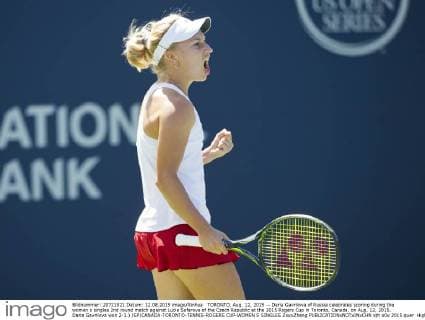 TORONTO, Aug. 12, 2015 -- Daria Gavrilova of Russia celebrates scoring during the women s singles 2nd round match against Lucie Safarova of the Czech Republic at the 2015 Rogers Cup in Toronto, Canada, on Aug. 12, 2015. Daria Gavrilova won 2-1.) (SP)CANADA-TORONTO-TENNIS-ROGERS CUP-WOMEN S SINGLES ZouxZheng 