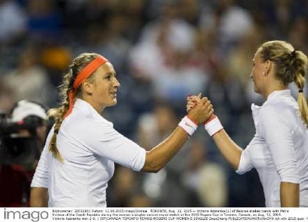 TORONTO, Aug. 12, 2015 -- Victoria Azarenka (L) of Belarus shakes hands with Petra Kvitova of the Czech Republic during the women s singles second round match at the 2015 Rogers Cup in Toronto, Canada, on Aug. 12, 2015. Victoria Azarenka won 2-0. ) (SP)CANADA-TORONTO-TENNIS-ROGERS CUP-WOMEN S SINGLES ZouxZheng 