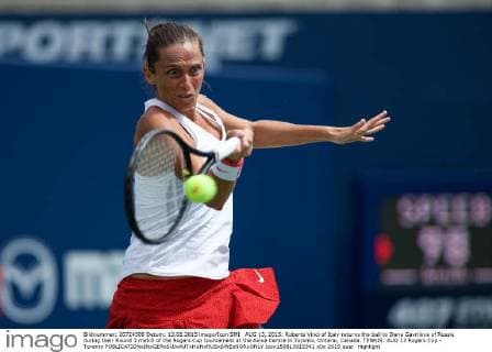 AUG 13, 2015: Roberta Vinci of Italy returns the ball to Daria Gavrilova of Russia during their Round 3 match of the Rogers Cup tournament at the Aviva Centre in Toronto, Ontario, Canada. TENNIS: AUG 13 Rogers Cup - Toronto Icon150813015341 EDITORIAL USE ONLY