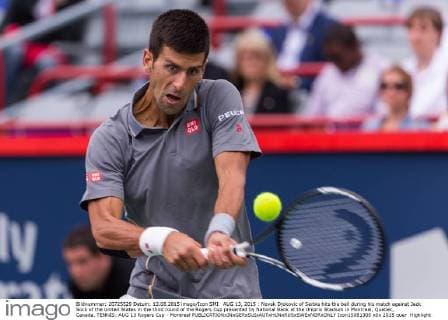 AUG 13, 2015 : Novak Djokovic of Serbia hits the ball during his match against Jack Sock of the United States in the third round of the Rogers Cup presented by National Bank at the Uniprix Stadium in Montreal, Quebec, Canada. TENNIS: AUG 13 Rogers Cup - Montreal Icon15081305 EDITORIAL USE ONLY