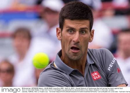 AUG 13, 2015 : Novak Djokovic of Serbia eyes the ball during his match against Jack Sock of the United States in the third round of the Rogers Cup presented by National Bank at the Uniprix Stadium in Montreal, Quebec, Canada. TENNIS: AUG 13 Rogers Cup - Montreal Icon15081306 EDITORIAL USE ONLY