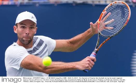 AUG 13, 2015 : Ivo Karlovic of Croatia hits the ball during his match against Jeremy Chardy of France in the third round of the Rogers Cup presented by National Bank at the Uniprix Stadium in Montreal, Quebec, Canada. TENNIS: AUG 13 Rogers Cup - Montreal Icon15081317 EDITORIAL USE ONLY