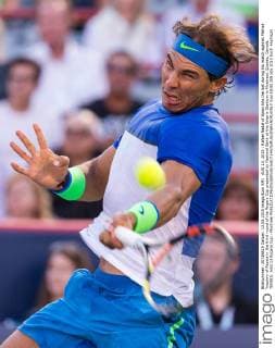 AUG 13, 2015 : Rafael Nadal of Spain hits the ball during his match against Mikhail Youzhny of Russia in the third round of the Rogers Cup presented by National Bank at the Uniprix Stadium in Montreal, Quebec, Canada. TENNIS: AUG 13 Rogers Cup - Montreal Icon15081359 EDITORIAL USE ONLY