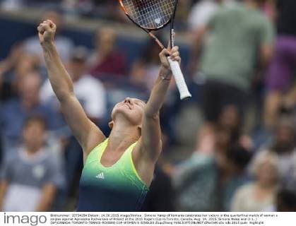 Simona Halep of Romania celebrates her victory in the quarterfinal match of women s singles against Agnieszka Radwanska of Poland at the 2015 Rogers Cup in Toronto, Canada, Aug. 14, 2015. Simona Halep won 2-1. ) (SP)CANADA-TORONTO-TENNIS-ROGERS CUP-WOMEN S SINGLES ZouxZheng 