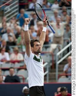 Jeremy Chardy of France celebrates after winning his quarterfinal match of men s singles against John Isner of the United States at the 2015 Rogers Cup in Montreal, Canada, Aug. 14, 2015. Chardy won the match 2-1. ) (SP)CANADA-MONTREAL-ROGERS CUP-MEN S SINGLES AndrewxSoong 