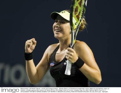 Belinda Bencic of Switzerland celebrates victory after the quarterfinal match of women s singles against Ana Ivanovic of Serbia at the 2015 Rogers Cup in Toronto, Canada, Aug. 14, 2015. Belinda Bencic won 2-0. ) (SP)CANADA-TORONTO-TENNIS-ROGERS CUP-WOMEN S SINGLES ZouxZheng 