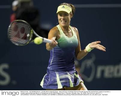 Ana Ivanovic of Serbia returns the ball during the quarterfinal match of women s singles against Belinda Bencic of Switerland at the 2015 Rogers Cup in Toronto, Canada, Aug. 14, 2015. Ana Ivanovic lost 0-2. ) (SP)CANADA-TORONTO-TENNIS-ROGERS CUP-WOMEN S SINGLES ZouxZheng 