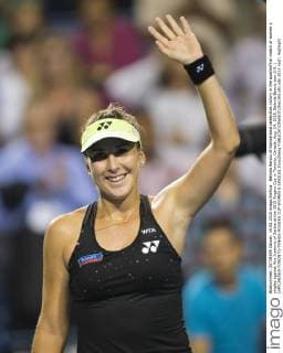 Belinda Bencic of Switzerland celebrates victory in the quarterfinal match of women s singles against Ana Ivanovic of Serbia at the 2015 Rogers Cup in Toronto, Canada, Aug. 14, 2015. Belinda Bencic won 2-0. ) (SP)CANADA-TORONTO-TENNIS-ROGERS CUP-WOMEN S SINGLES ZouxZheng 
