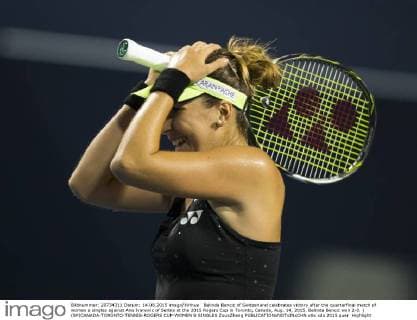 Belinda Bencic of Switzerland celebrates victory after the quarterfinal match of women s singles against Ana Ivanovic of Serbia at the 2015 Rogers Cup in Toronto, Canada, Aug. 14, 2015. Belinda Bencic won 2-0. ) (SP)CANADA-TORONTO-TENNIS-ROGERS CUP-WOMEN S SINGLES ZouxZheng 