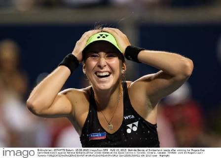 AUG 15, 2015: Belinda Bencic of Switzerland reacts after winning her Rogers Cup semi-final match against Serena Williams of the United States at the Aviva Centre in Toronto, Ontario, Canada. TENNIS: AUG 15 Rogers Cup - Toronto Icon15081508422 EDITORIAL USE ONLY