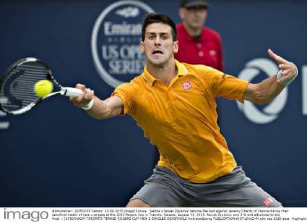 Serbia s Novak Djokovic returns the ball against Jeremy Chardy of France during their semifinal match of men s singles at the 2015 Rogers Cup in Toronto, Canada, August 15, 2015. Novak Djokovic won 2-0 and advanced to the final. ) (SP)CANADA-TORONTO-TENNIS-ROGERS CUP-MEN S SINGLES SEMIFINALS AndrewxSoong 