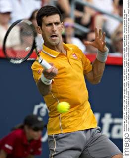 Serbia s Novak Djokovic returns the ball against Jeremy Chardy of France during their semifinal match of men s singles at the 2015 Rogers Cup in Toronto, Canada, August 15, 2015. Novak Djokovic won 2-0 and advanced to the final. ) (SP)CANADA-TORONTO-TENNIS-ROGERS CUP-MEN S SINGLES SEMIFINALS AndrewxSoong 