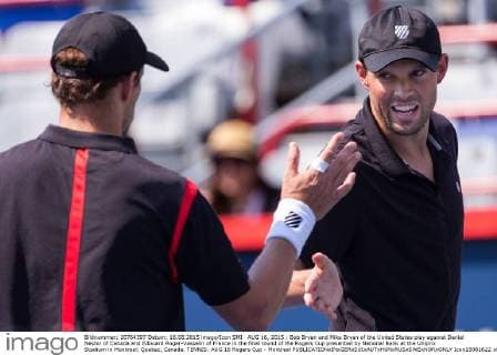 AUG 16, 2015 : Bob Bryan and Mike Bryan of the United States play against Daniel Nestor of Canada and Edouard Roger-Vasselin of France in the final round of the Rogers Cup presented by National Bank at the Uniprix Stadium in Montreal, Quebec, Canada. TENNIS: AUG 16 Rogers Cup - Montreal Icon15081622 EDITORIAL USE ONLY