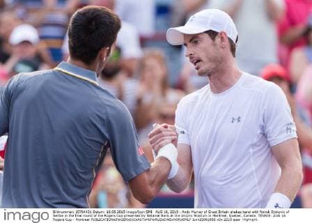 AUG 16, 2015 : Andy Murray of Great Britain shakes hand with Novak Djokovic of Serbia in the final round of the Rogers Cup presented by National Bank at the Uniprix Stadium in Montreal, Quebec, Canada. TENNIS: AUG 16 Rogers Cup - Montreal Icon15081656 EDITORIAL USE ONLY