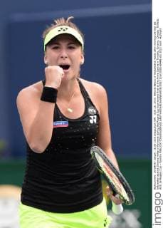 AUG 16, 2015: Belinda Bencic of Switzerland reacts after winning the first set tiebreaker against Simona Halep of Romania during the Rogers Cup tournament final at the Aviva Centre in Toronto, Ontario, Canada. TENNIS: AUG 16 Rogers Cup - Toronto Icon1508160448 EDITORIAL USE ONLY