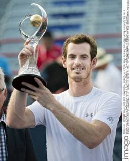 Andy Murray of Britain shows the trophy during the awarding ceremony for the men s singles event of the Rogers Cup tennis tournament at the Uniprix Stadium in Montreal, Canada, on Aug. 16, 2015. Andy Murray beat Novak Djokovic of Serbia in the men s singles final 2-1 on Sunday and claimed the title. ) (SP)CANADA-MONTREAL-ROGERS CUP-MEN S SINGLES FINAL AndrewxSoong 