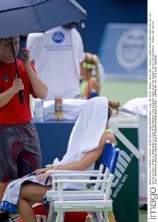 Aug. 19, 2015 - Mason, Ohio, USA - Simona Halep (ROU) gets relief from the sun during an injury break in Wednesday s round of the Western and Southern Open at at the Lindner Family Tennis Center , Mason, Oh. Tennis 2015 - Western & Southern Open - ZUMAs304