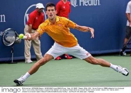 Aug. 19, 2015 - Mason, Ohio, USA - Novak Djokovic (SRB) slides to hit a forehand return shot during Wednesday s round of the Western and Southern Open at at the Lindner Family Tennis Center , Mason, Oh. Tennis 2015 - Western & Southern Open - ZUMAs304