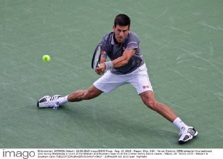 Aug. 19, 2015 - Mason, Ohio, USA - Novak Djokovic (SRB) slides to hit a backhand shot during Wednesday s round of the Western and Southern Open at at the Lindner Family Tennis Center , Mason, Oh. Tennis 2015 - Western & Southern Open - ZUMAs304