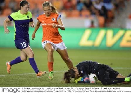 Aug. 21, 2015 - Houston, Texas, U.S - Seattle Reign goalkeeper Hope Solo (1) stops a shot by Houston Dash forward Melissa Henderson (21) during the second half of an NWSL game between the Houston Dash and the Seattle Reign at BBVA Compass Stadium in Houston, TX on August 21st, 2015. The Reign won 3-0. NWSL 2015 - Houston Dash vs Seattle Reign - ZUMAs127