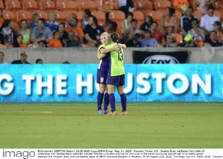 Aug. 21, 2015 - Houston, Texas, U.S - Seattle Reign midfielder Kim Little (8) celebrates with Seattle Reign defender Kendall Fletcher (13) after scoring her 2nd goal of the game during the second half of an NWSL game between the Houston Dash and the Seattle Reign at BBVA Compass Stadium in Houston, TX on August 21st, 2015. The Reign won 3-0. NWSL 2015 - Houston Dash vs Seattle Reign - ZUMAs127