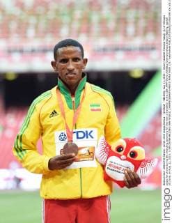 (150822) --BEIJING, Aug 22, 2015 -- Silver medallist Yemane Tsegay (L) of Ethiopia poses for photo during the awarding ceremony for the men s marathon at the 15th IAAF World Athletics Championships 2015 in Beijing, capital of China, on Aug. 22, 2015. ) (SP)CHINA-BEIJING-IAAF WORLD CHAMPIONSHIPS-MEN S MARATHON (CN) YuexYuewei 