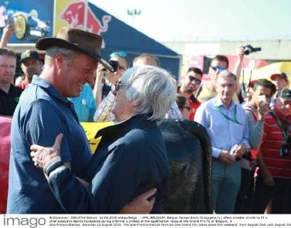 - SPA, BELGIUM: Belgian farmer Erwin Schopgens (L) offers a bottle of milk to F1 s chief executive Bernie Ecclestone during a farmer s protest at the qualification races at the Grand Prix F1 of Belgium, in Spa-Francorchamps, Saturday 22 August 2015. The Spa-Francorchamps Formula One Grand Prix takes place this weekend, from August 21st until August 23rd. GEORGESxDExCOSTER  x04684500x