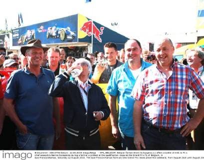 - SPA, BELGIUM: Belgian farmer Erwin Schopgens (L) offers a bottle of milk to F1 s chief executive Bernie Ecclestone during a farmer s protest at the qualification races at the Grand Prix F1 of Belgium, in Spa-Francorchamps, Saturday 22 August 2015. The Spa-Francorchamps Formula One Grand Prix takes place this weekend, from August 21st until August 23rd. GEORGESxDExCOSTER  x04684515x