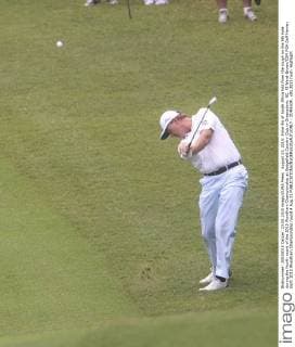 August 23, 2015: Ernie Els of South Africa hits from the rough on the 9th hole during the fourth round of the 2015 Wyndham Championship at Sedgefield Country Club in Greensboro, NC. PJ Ward-Brown CSM PGA Golf Herren Golf: 2015 Wyndham Championship round 4 Aug 23 - ZUMAc04_