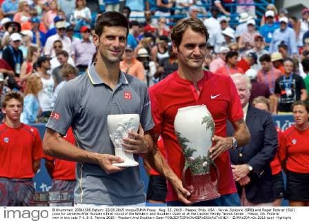 Aug. 23, 2015 - Mason, Ohio, USA - Novak Djokovic (SRB) and Roger Federer (SUI) pose for cameras after Sunday s final round of the Western and Southern Open at at the Lindner Family Tennis Center , Mason, Oh. Federer won in two sets 7-6, 6-3. Tennis 2015 - Western And Southern Open - ZUMAs304