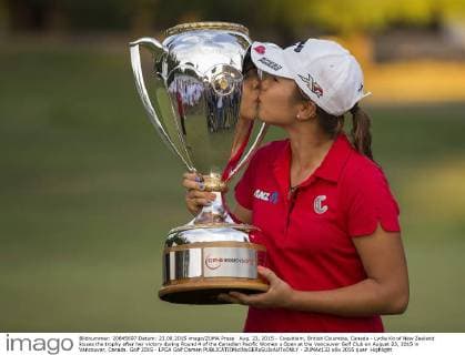 Aug. 23, 2015 - Coquitlam, British Columbia, Canada - Lydia Ko of New Zealand kisses the trophy after her victory during Round 4 of the Canadian Pacific Women s Open at the Vancouver Golf Club on August 23, 2015 in Vancouver, Canada. Golf 2015 - LPGA Golf Damen - ZUMAc132