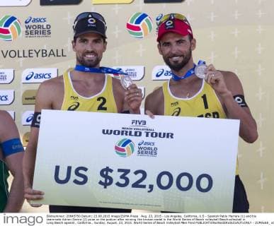 Aug. 23, 2015 - Los Angeles, California, U.S - Spanish Pablo Herrera (1) and his teammate Adrian Gavira (2) pose on the podium after winning the bronze medal in the World Series of Beach volleyball Beachvolleyball in Long Beach against , California., Sunday, August. 23, 2015. World Series of Beach Volleyball Men Final - ZUMAc68_