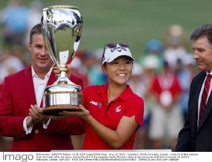 Aug. 23, 2015 - Coquitlam, British Columbia, Canada - Lydia Ko of New Zealand hoist the trophy after her victory during Round 4 of the Canadian Pacific Women s Open at the Vancouver Golf Club on August 23, 2015 in Vancouver, Canada. Golf 2015 - LPGA Golf Damen - ZUMAc132