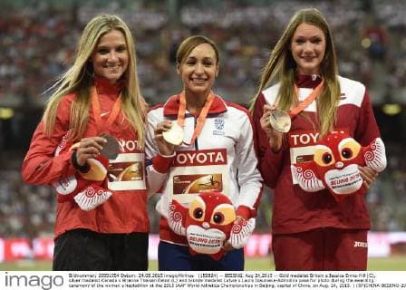 (150824) -- BEIJING, Aug 24,2015 -- Gold medalist Britain s Jessica Ennis-Hill (C), silver medalist Canada s Brianne Theisen Eaton (L) and bronze medalist Latvia s Laura Ikauniece-Admidina pose for photo during the awarding ceremony of the women s heptathlon at the 2015 IAAF World Athletics Championships in Beijing, capital of China, on Aug. 24, 2015. ) (SP)CHINA-BEIJING-2015 IAAF WORLD CHAMPIONSHIPS-WOMEN S HEPTATHLON AWARDING CEREMONY (CN) GongxLei 