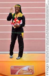 (150825) -- BEIJING, Aug. 25, 2015 -- Gold medalist Jamaica s Shelly-Ann Fraser-Pryce celebrates during the awarding ceremony of the women s 100m event at the 2015 IAAF World Championships at the Bird s Nest National Stadium in Beijing, capital of China, Aug. 25, 2015. ) (SP)CHINA-BEIJING-IAAF WORLD CHAMPIONSHIPS-WOMEN S 100M AWARDING CEREMONY (CN) LixWen 