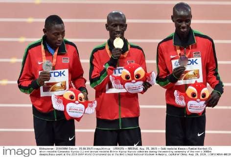 (150825) -- BEIJING, Aug. 25, 2015 -- Gold medalist Kenya s Ezekiel Kemboi (C), silver medalist Conseslus Kipruto (L) and bronze medalist Brimin Kiprop Kipruto celebrate during the awarding ceremony of the men s 3000m steeplechase event at the 2015 IAAF World Championships at the Bird s Nest National Stadium in Beijing, capital of China, Aug. 25, 2015. ) (SP)CHINA-BEIJING-IAAF WORLD CHAMPIONSHIPS-MEN S 3000M STEEPLECHASE AWARDING CEREMONY (CN) LixWen 