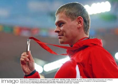 BEIJING, CHINA. AUGUST 26, 2015. Silver medalist Denis Kudryavtsev (C) of Russia poses at a victory ceremony for the men s 400m hurdles event at the 15th IAAF World Championships in Athletics, at the National Stadium. Vladimir Smirnov TASS  TS00B703