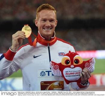(150826) -- BEIJING, Aug. 26, 2015 -- Gold medalist Britain s Greg Rutherford celebrates during the awarding ceremony of men s long jump at the 2015 IAAF World Championships at the Bird s Nest National Stadium in Beijing, capital of China, Aug. 26, 2015. ) (SP)CHINA-BEIJING-IAAF WORLD CHAMPIONSHIPS-MEN S LONG JUMP AWARDING CEREMONY (CN) WangxHaofei 