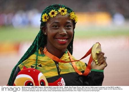 Shelly-Ann Fraser-Pryce, JAM, during 100m award ceremony at the 2015 worlds in Beijing; 25 08 2015;