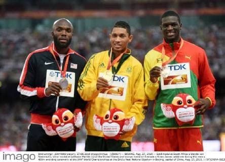 (150827) -- BEIJING, Aug. 27, 2015 -- Gold medalist South Africa s Wayde van Niekerk(C), silver medalist LaShawn Merritt (L) of the United States and bronze medalist Grenada s Kirani James celebrate during the men s 400m awarding ceremony at the IAAF World Championships at the Bird s Nest Naitonal Stadium in Beijing, capital of China, Aug. 27, 2015. ) (SP)CHINA-BEIJING-IAAF WORLD CHAMPIONSHIPS-MEN S 400M AWARDING CEREMONY (CN) LixWen 