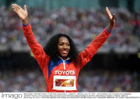 (150827) -- BEIJING, Aug. 27, 2015 -- Gold medalist Cuba s Yarisley Silva celebrates during the women s pole vault awarding ceremony at the IAAF World Championships at the Bird s Nest Naitonal Stadium in Beijing, capital of China, Aug. 27, 2015. ) (SP)CHINA-BEIJING-IAAF WORLD CHAMPIONSHIPS-WOMEN S POLE VAULT AWARDING CEREMONY (CN) LixWen 