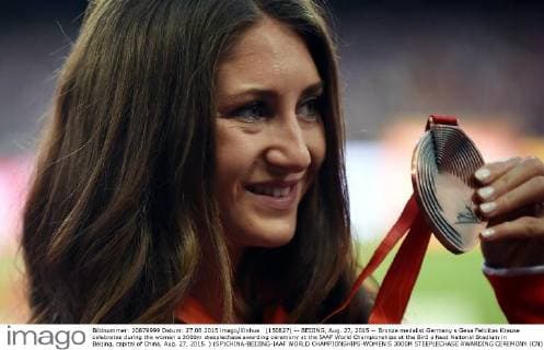 (150827) -- BEIJING, Aug. 27, 2015 -- Bronze medalist Germany s Gesa Felicitas Krause celebrates during the women s 3000m steeplechase awarding ceremony at the IAAF World Championships at the Bird s Nest Naitonal Stadium in Beijing, capital of China, Aug. 27, 2015. ) (SP)CHINA-BEIJING-IAAF WORLD CHAMPIONSHIPS-WOMEN S 3000M STEEPLECHASE AWARDING CEREMONY (CN) LixWen 