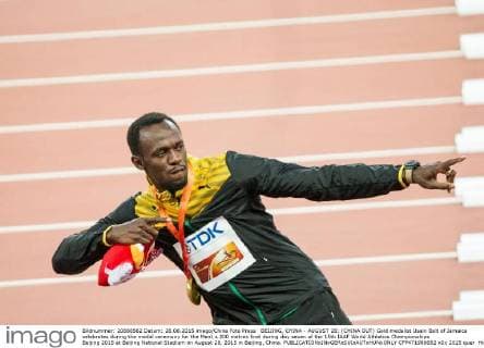BEIJING, CHINA - AUGUST 28: (CHINA OUT) Gold medalist Usain Bolt of Jamaica celebrates during the medal ceremony for the Men s 200 metres final during day seven of the 15th IAAF World Athletics Championships Beijing 2015 at Beijing National Stadium on August 28, 2015 in Beijing, China.  CFP471986682 